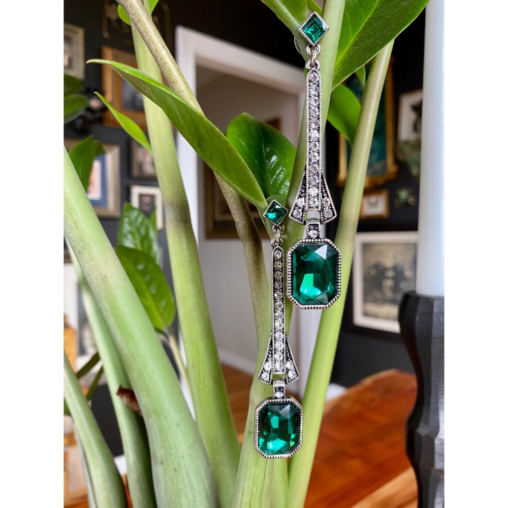 Art Deco style silver and emerald earrings.